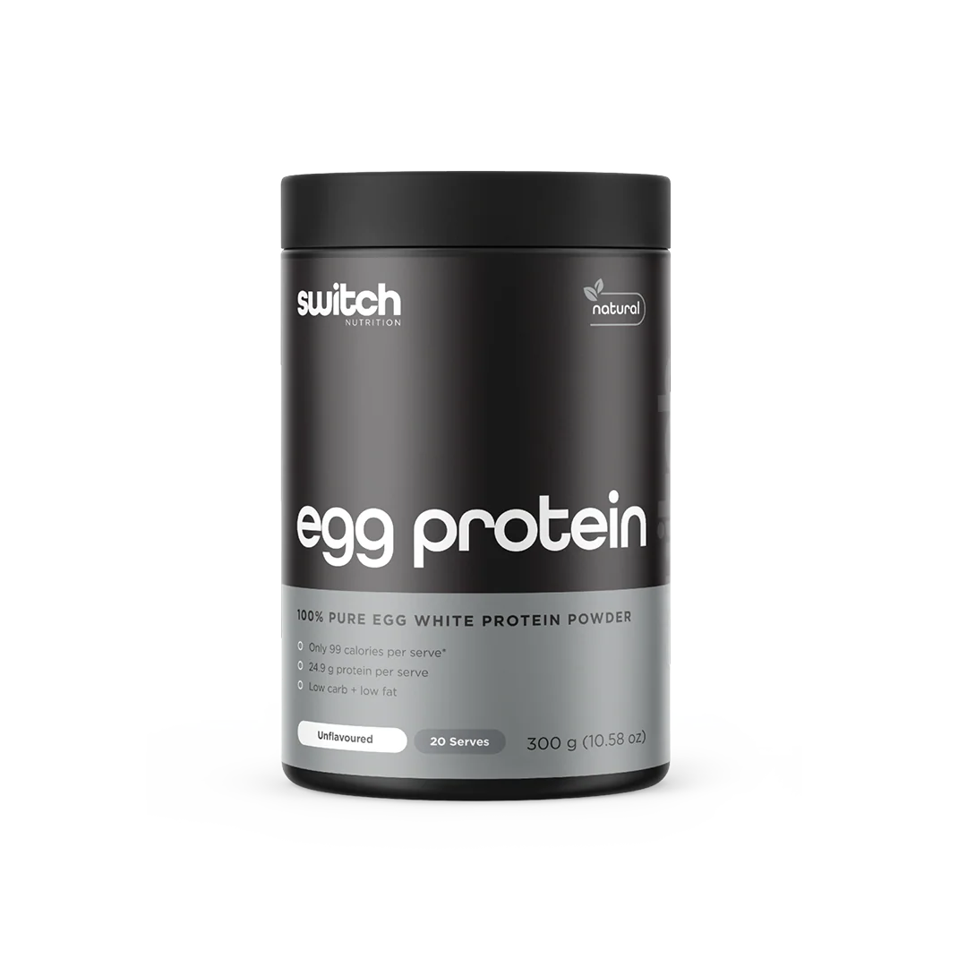 Black container of switch egg protein powder on a white background