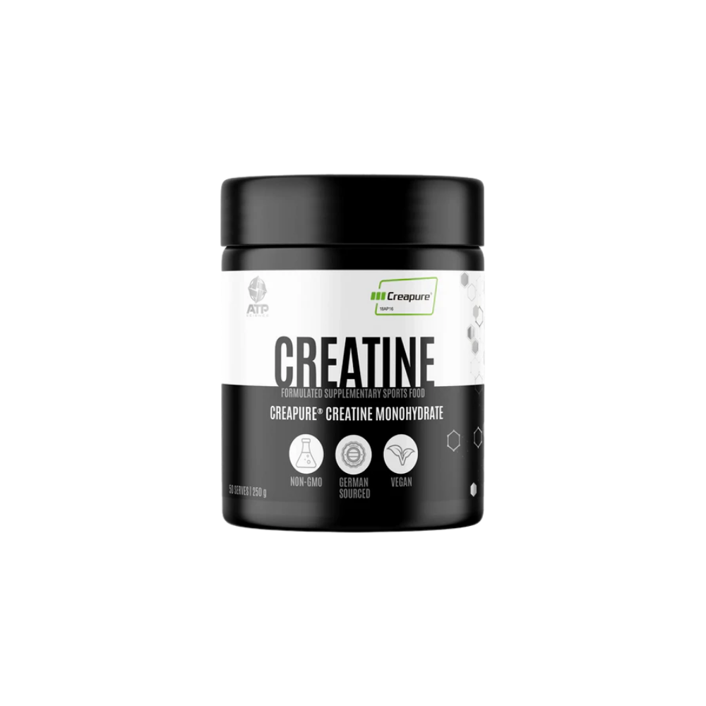 Creatine supplement container with black lid and white body on a white background
