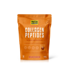 Orange package of collagen peptides on a white background