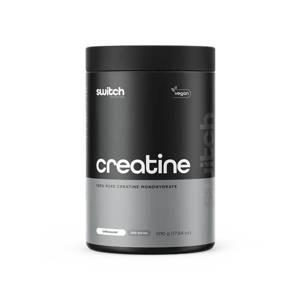 Black and gray container of switch Nutrition creatine powder on a white background
